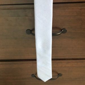 Solid light blue penguin necktie